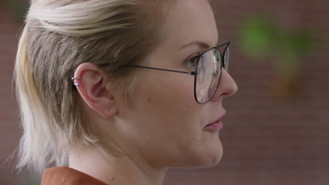 portrait-professional-business-woman-discussing-creative-ideas-beautiful-female-office-manager-sharing-conversation-wearing-glasses-in-modern-startup-workplace-close-up