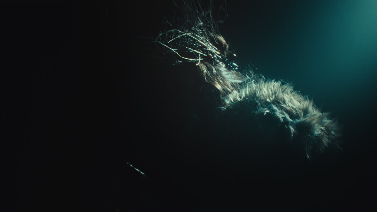 A creepy witch rises her head during the night storm