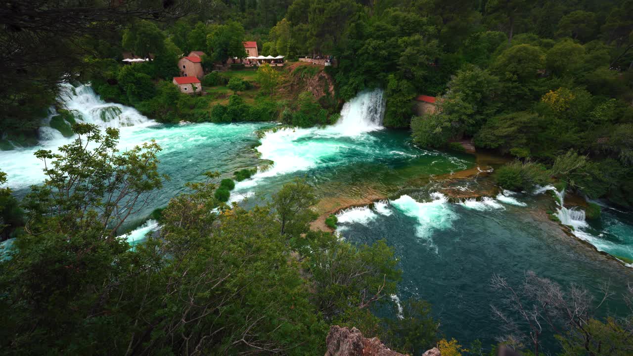 Spectacular view of turquoise waterfall cascades in beautiful Krka National Park during spring