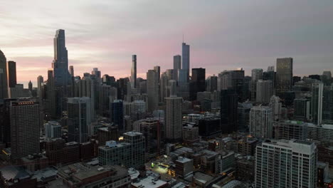 aerial view over the near north side cityscape, sunrise in chicago, illinois, usa