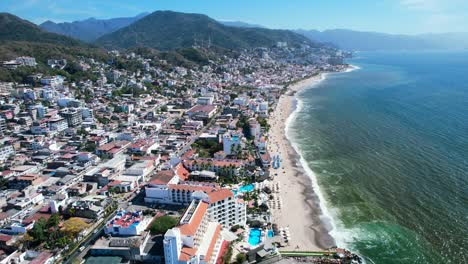 panoramic mountain coastline of puerto vallarta mexico on sunny day, aerial