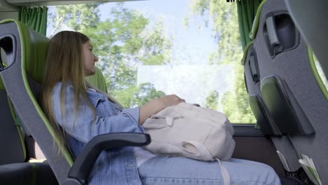 budget travel by bus young female traveler is traveling by bus concept of travel and active budget travel by bus young female traveler is traveling by bus concept of travel and active lifestyle