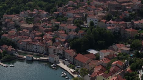 aerial view small city of bakar, croatia, istria. zoom out.