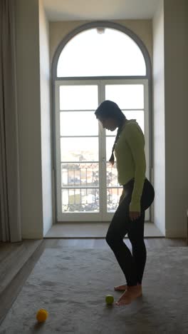 woman doing balance exercises at home