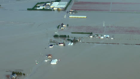 submerged houses and farms after catastrophic flooding in abbotsford, british columbia, canada