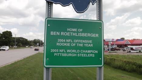 findlay, ohio sign showing hometown of ben roethlisberger with gimbal video moving forward