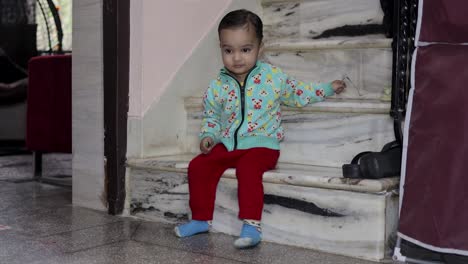 smiling kid innocent facial expression at indoor at night