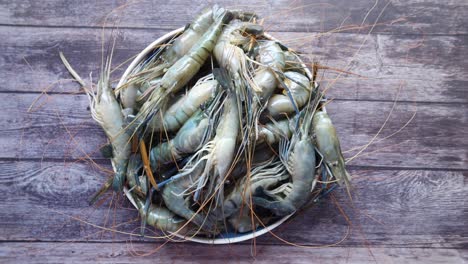 close up of king prawn on plate on table