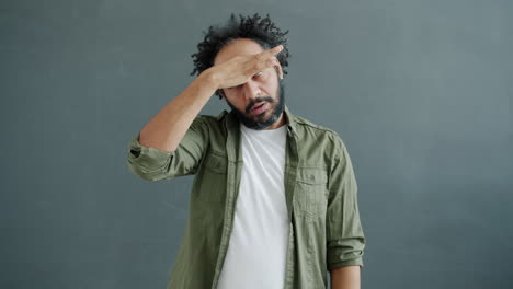 man expressing concern or frustration