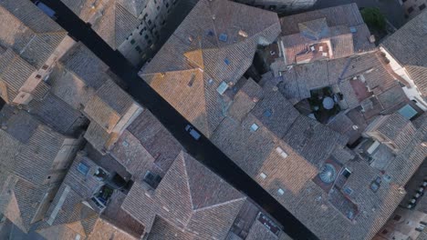 top down aerial view of siena, tuscany, italy at sunrise with medieval town in 4k