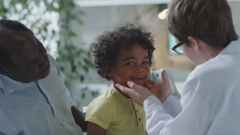 medical exam with child and father