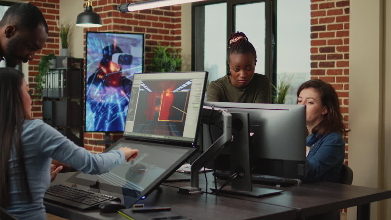 Employees doing it work to develop new interface in agency studio