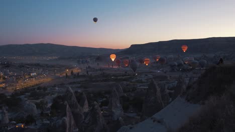 spectacular wide shot over cappadocia goreme hot air balloons take off