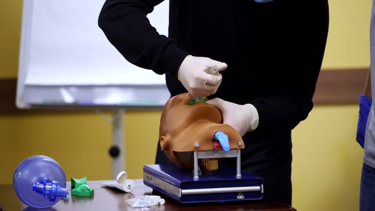 Closeup detail of a medical simulation mannequin head used for practicing anesthetic techniques. Healthcare and education