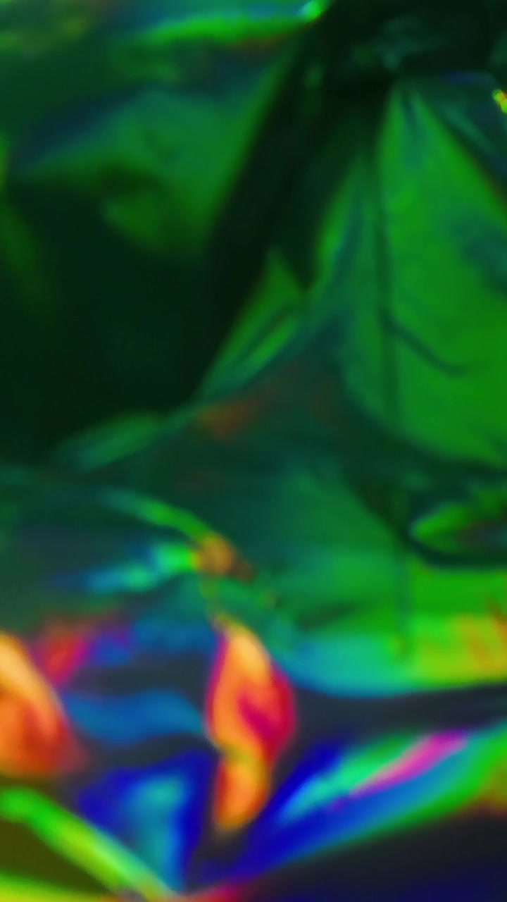 Sfondo Astratto di Lamina Olografica Cangiante Rossa e Verde