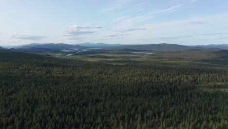 Aerial-shot-of-remote-wilderness-above-polar-circle-in-Sweden-on-a-clear-day