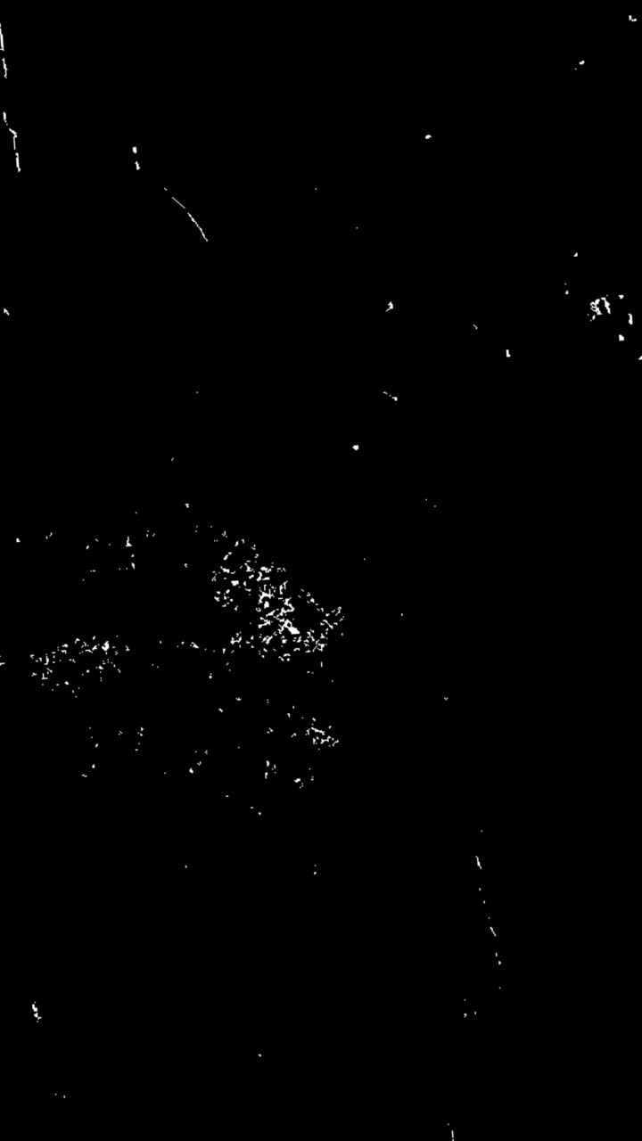 Vintage Film Grain and Dust Overlay on Black Background