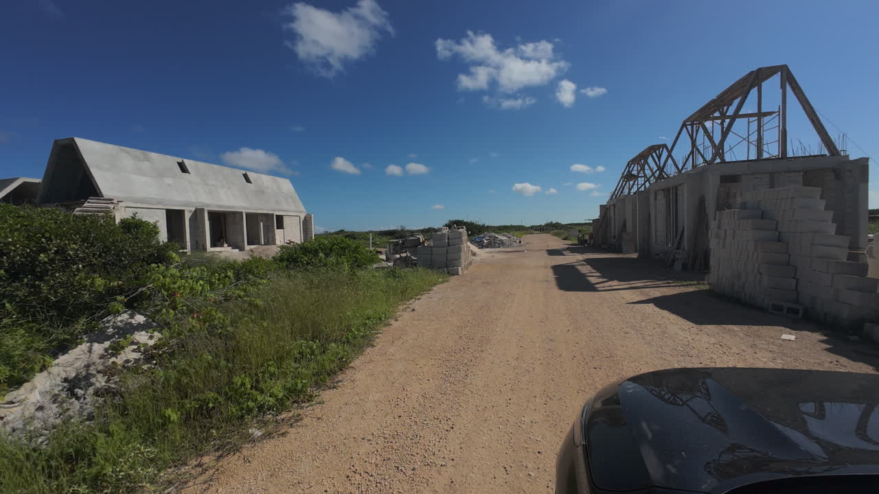 Sisal Travel and Coastal Development. Dynamic video sequence showcasing the vibrant lifestyle and real estate growth in Sisal, Yucatán. Car detail