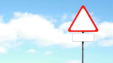 Blank-signboard-post-with-copy-space-against-clouds-in-the-blue-sky