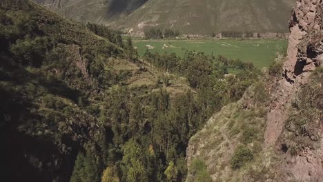 flight over the mountains towards the horizon near salto del fraile, lima, peru