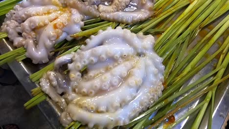 raw octopus at a food market in ho chi minh city, vietnam