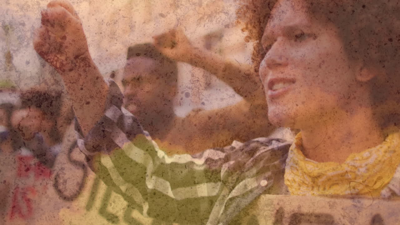 Animation of spots over diverse demonstrators raising hands outdoors