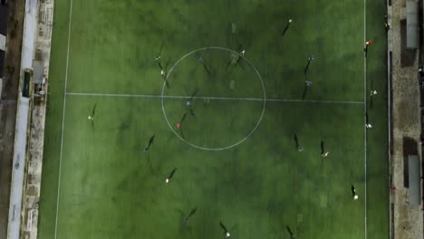 teen soccer players train in a friendly game overnight