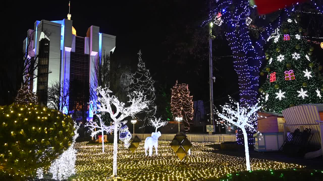 View of lights on trees at a Christmas Market in Chisinau, Moldova in the evening