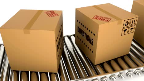 cardboard boxes with donations moves on a conveyor for delivery