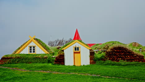 traditional icelandic houses with grass on the roof