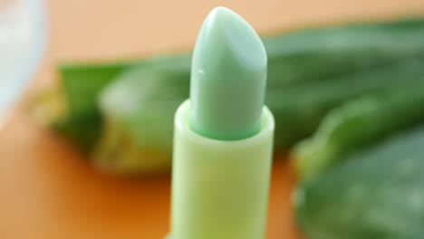 light green lipstick and cucumber