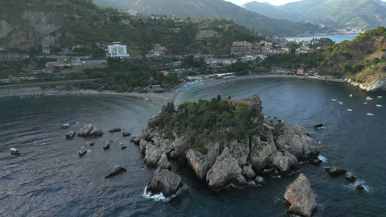 4K Aerial of Isola Bella at Sunset, in Taormina, Sicily in July 2025