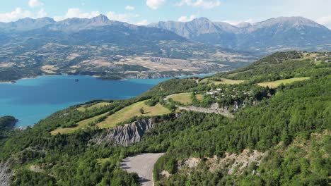 Lake-Serre-Poncon-and-Nature-Landscape-in-French-Alps,-France---Aerial-4k-Circling