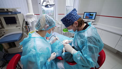 dentist performing dental procedure on a patient