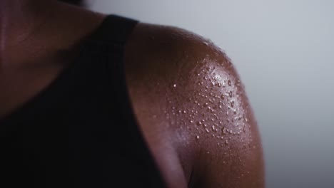 close up shot of beads of sweat on woman wearing gym fitness clothing exercising 3