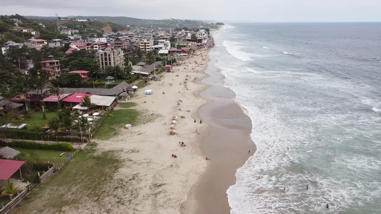 Aerial View of a Coastal Town with Beach and Ocean