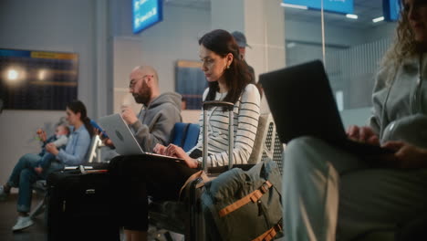passengers waiting in airport terminal