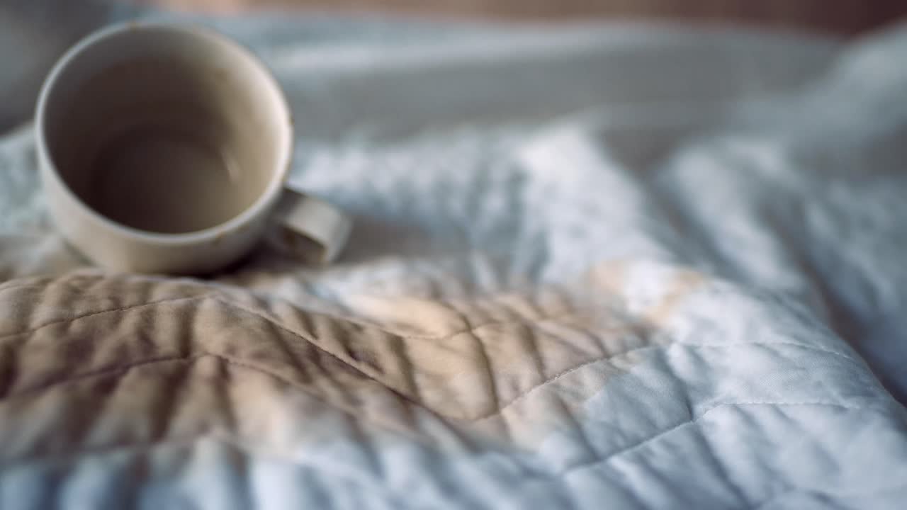 Coffee stain on bedding