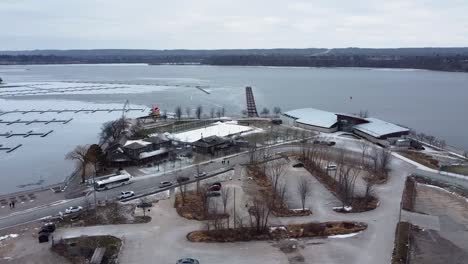 drone circling over frozen hamilton harbor on lake ontario