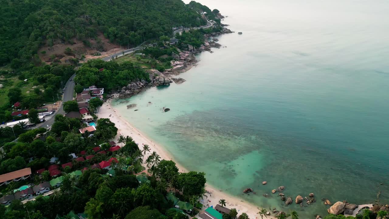 Thailand's Hidden Gem Aerial View of Koh Samui's Lush Mountains and Coral Beach