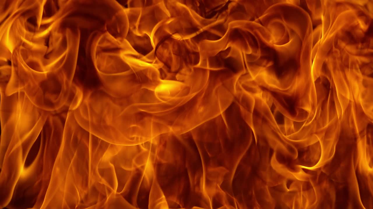 Flames of fire on black background in slow motion