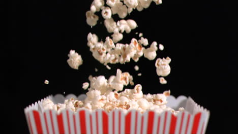 popcorn falling into bag in super slow motion