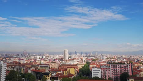 timelapse of milan skyline. clouds flowing. shadow changing