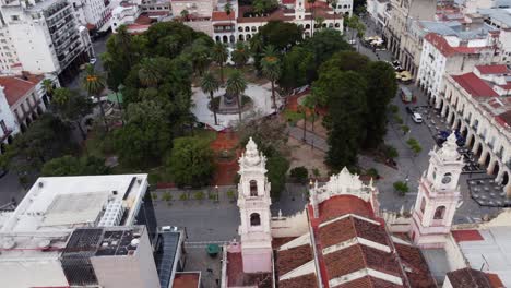 July-9-Square-in-Salta-Argentina,-aerial-flyover-of-Salta-Cathedral