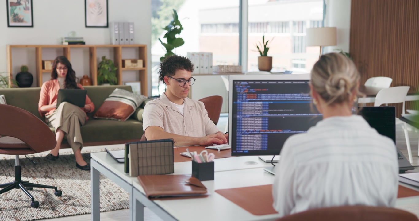 Diverse Team of Software Developers Working in Modern Office