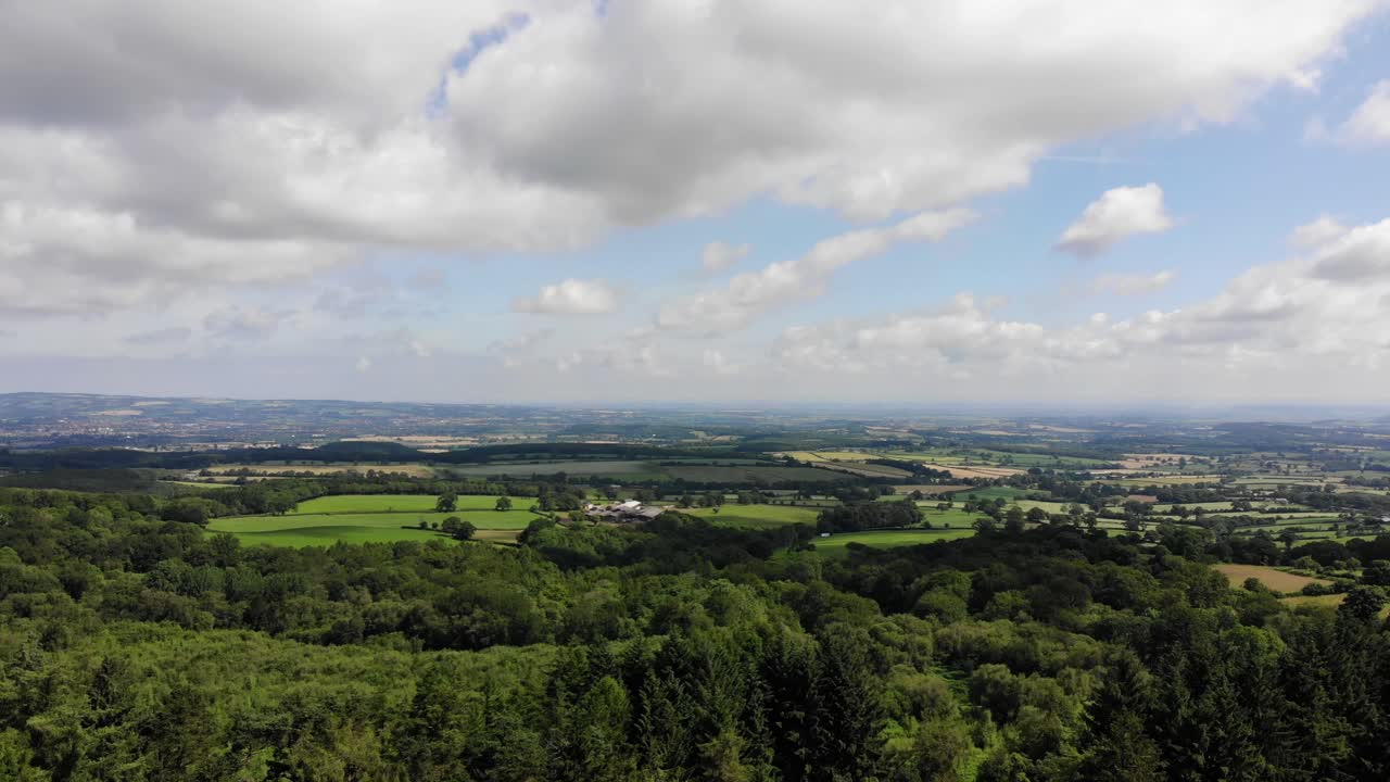 Aerial view of the Blackdown Hills AONB, a stunning landscape of rolling hills, valleys, and forests in Somerset, England
