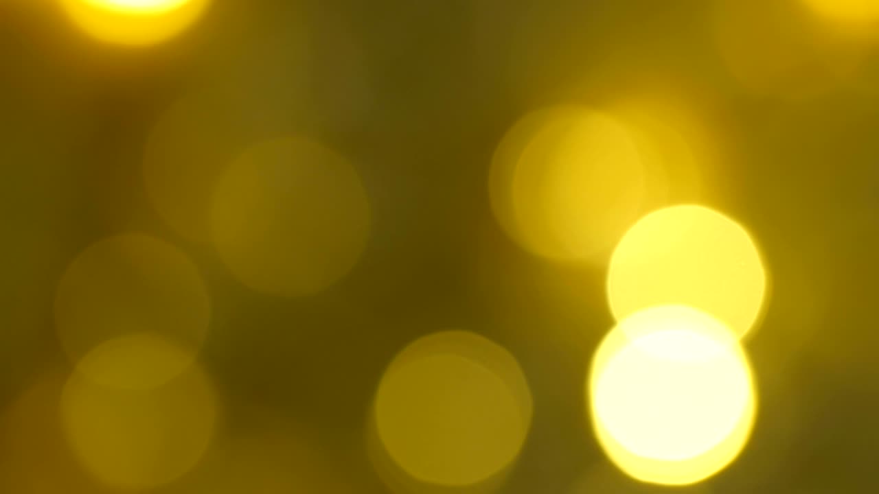 Yellow LEDs blink slowly in a blurry focus.