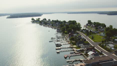 drone shot of the beach houses and boats at sodus point new york vacation spot at the tip of land on the banks of lake ontario