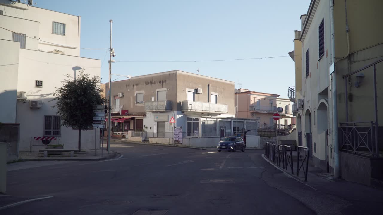 Camera shot of a calm intersection in Torregaveta, Italy