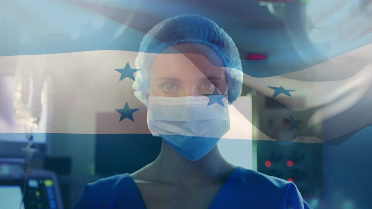 Animazione della bandiera dell'Honduras che sventola su chirurghi in sala operatoria